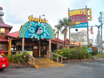 a restaurant with a sign with a fish on it at Sunrise Beach #903 in Panama City Beach