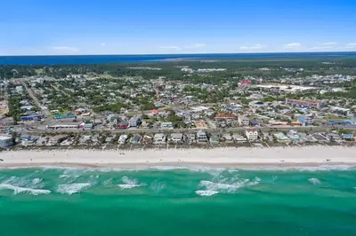 an aerial view of a beach with a resort at Beach House - Family Tides by Panhandle Getaways in Panama City Beach