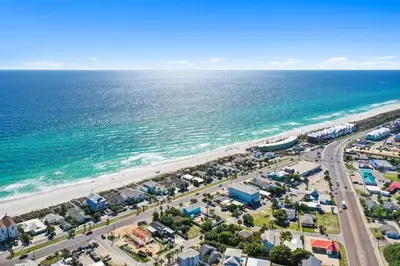an aerial view of a beach and the ocean at Beach House - Family Tides by Panhandle Getaways in Panama City Beach