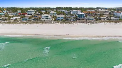 an aerial view of a beach with houses at Beach House - Family Tides by Panhandle Getaways in Panama City Beach