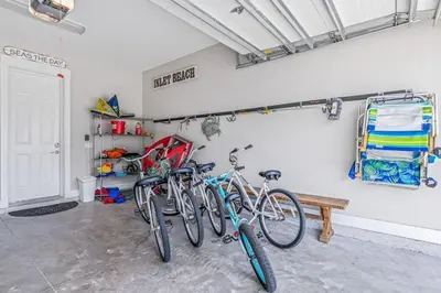 two bikes parked against a wall in a garage at Seas The Day 30A in Santa Rosa Beach