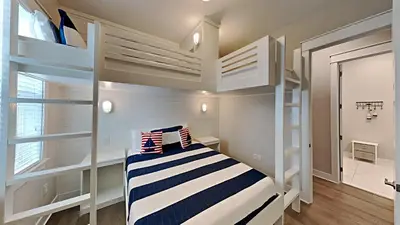 a small bedroom with bunk beds in a house at Prominence 30A - Hey Hey 30A in Inlet Beach