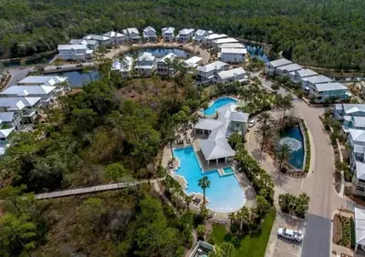 an aerial view of a resort with a pool at Pines and Palmettos in Santa Rosa Beach