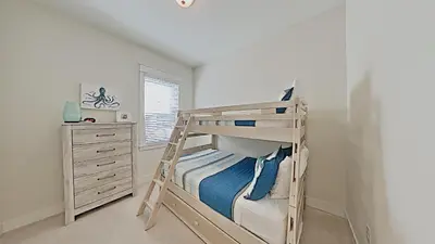 a bedroom with a bunk bed with a ladder at Prominence 30A - Mint Julep in Inlet Beach