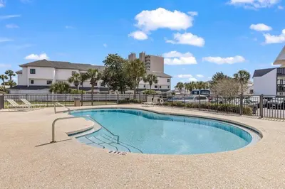 a swimming pool in the middle of a building at Time To Coast in Santa Rosa Beach