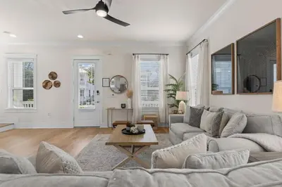 a living room with a couch and a table at Casa Del Sol - Inlet Beach in Inlet Beach