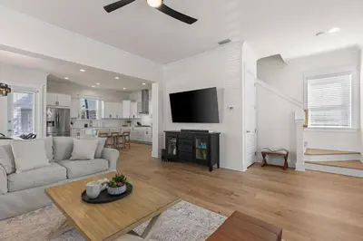 a living room with a couch and a table at Casa Del Sol - Inlet Beach in Inlet Beach