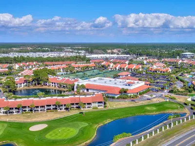 an aerial view of a resort with a golf course at Edgewater Villa #2104 in Panama City Beach
