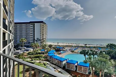 a view of a resort with a pool and a beach at Edgewater Tower I 406 in Panama City Beach