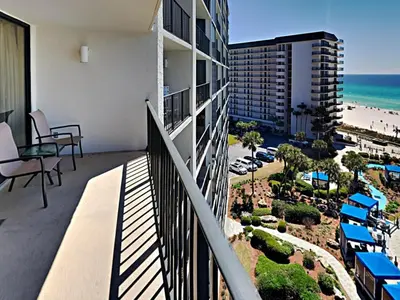 a balcony of a condo with a view of the beach at Edgewater Tower I 806 in Panama City Beach