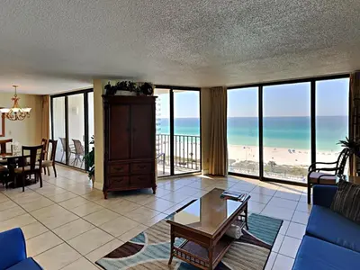 a living room with a view of the ocean at Edgewater Tower I 806 in Panama City Beach