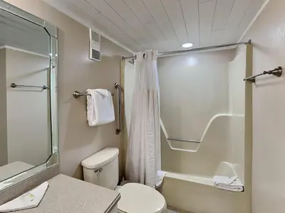 a bathroom with a toilet and a shower at Edgewater Tower II 1001 in Panama City Beach