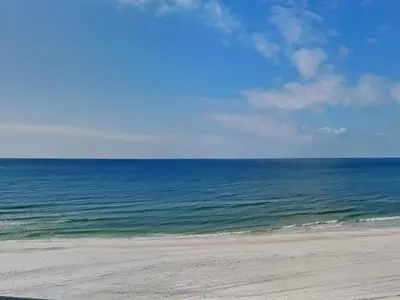an empty beach with the ocean in the background at Edgewater Tower III #501 in Panama City Beach
