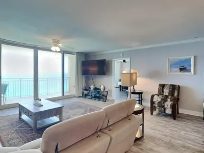 a living room with a couch and a table at Emerald Beach #2535 in Panama City Beach