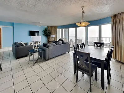 a living room with a table and a couch at Long Beach Resort Tower II #306 in Panama City Beach