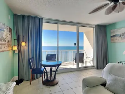 a living room with a view of the ocean at Majestic Beach Towers I #2108 in Panama City Beach