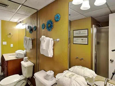 a bathroom with a toilet and a shower at Edgewater Tower II #204 in Panama City Beach