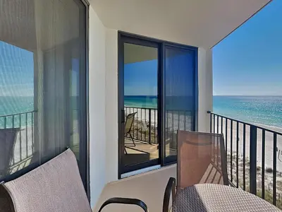 a balcony with a view of the ocean at Edgewater Tower Ii 504 in Panama City Beach