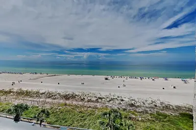 an aerial view of a beach with people on it at Edgewater Tower III #607 in Panama City Beach