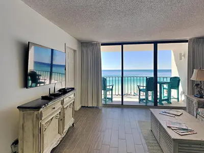 a living room with a view of the ocean at Edgewater Tower III #804 in Panama City Beach