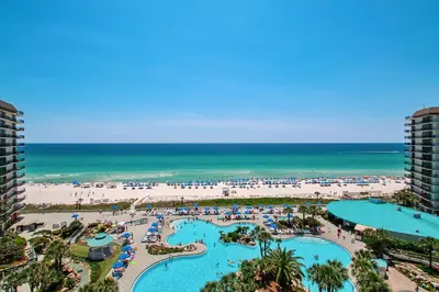 an aerial view of a resort with a beach at Edgewater Leeward #302 in Panama City Beach