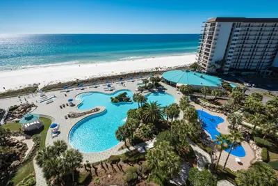 an aerial view of a resort with a beach at Edgewater Leeward #302 in Panama City Beach