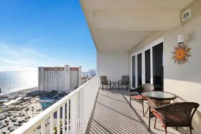 a balcony with a view of the ocean at Laketown Wharf 1907 in Panama City Beach