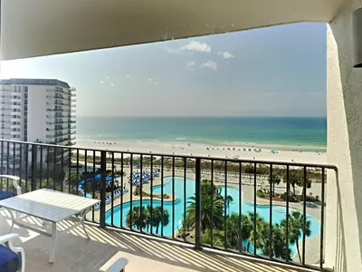 a view of the beach from the balcony of a condo at Edgewater Tower I 807 in Panama City Beach