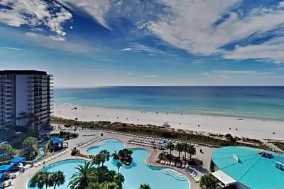 an aerial view of a resort with a beach at Edgewater Tower I 1010 in Panama City Beach