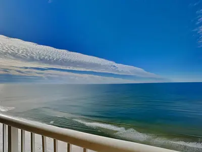 a view of the ocean from a balcony at Majestic Beach Towers II #2005 in Panama City Beach