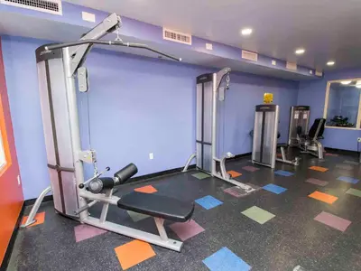 a room with a gym with a treadmill at Shores of Panama #1706 in Panama City Beach