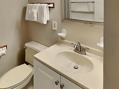 a bathroom with a sink and a toilet at Summit Beach Resort #429 in Panama City Beach