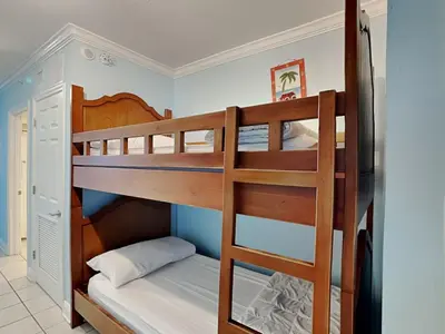 a couple of bunk beds in a room at Emerald Beach #1127 in Panama City Beach