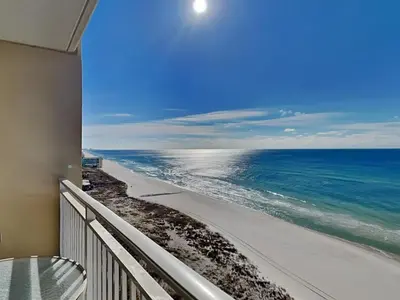a balcony with a view of the ocean at Emerald Beach #1127 in Panama City Beach