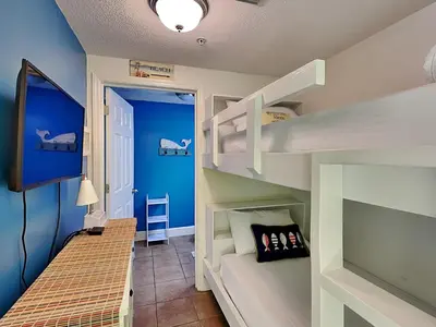 a bunk bed in a room with a bunk bedscribed at Majestic Beach Towers I #405 in Panama City Beach