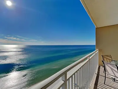 a balcony with a view of the ocean at Emerald Beach #1927 in Panama City Beach