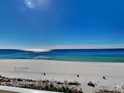 a beach with birds on the sand and the ocean at Long Beach Resort Tower I #503 in Panama City Beach