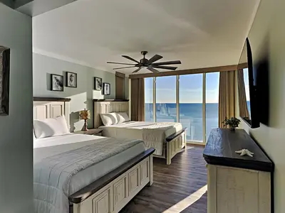 a hotel room with two beds and a large window at Long Beach Resort Tower I #900 in Panama City Beach