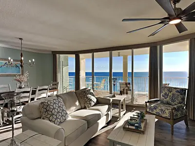 a living room with a couch and a table at Long Beach Resort Tower I #900 in Panama City Beach