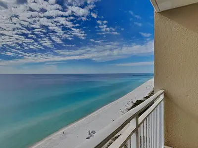 a balcony with a view of the ocean at Emerald Beach #1934 in Panama City Beach
