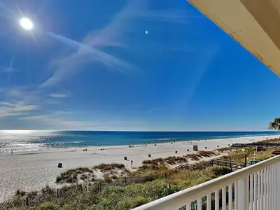 a view of the beach from the balcony of a condo at Majestic Beach Towers I #207 in Panama City Beach