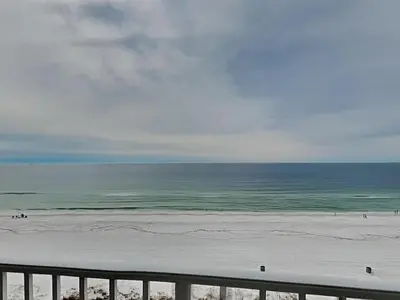 a view of the ocean from a balcony of a beach at Long Beach Resort Tower III #602 in Panama City Beach