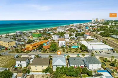 an aerial view of a small town next to the beach at Little Palm Unit A in Panama City Beach