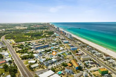 an aerial view of a city and the beach at Top Shelf 47 Unit C in Panama City Beach