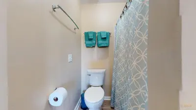 a bathroom with a toilet and a shower at Near Pier Park and Beach - Pools Onsite - FLPCB66 in Panama City Beach