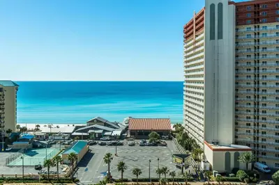 an aerial view of a building and a parking lot at Laketown Wharf 116 in Panama City Beach