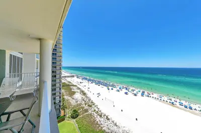 a view of the beach from the balcony of a condo at Long Beach Resort 1-1203 in Panama City Beach
