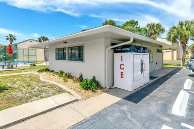 a building with a gas pump in front of it at Gulf Highlands 220 in Panama City Beach