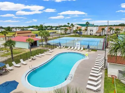 an overhead view of a swimming pool at a resort at Keep Palm and Carry On - 5 min walk to beach in Panama City Beach
