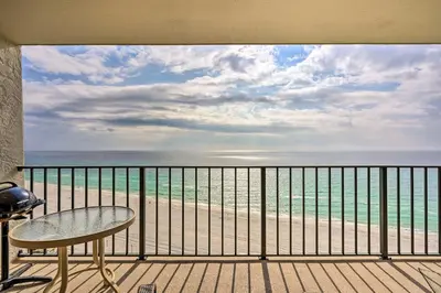 a balcony with a view of the beach at Idyllic PCB Condo with Pool Access and Ocean Views! in Panama City Beach